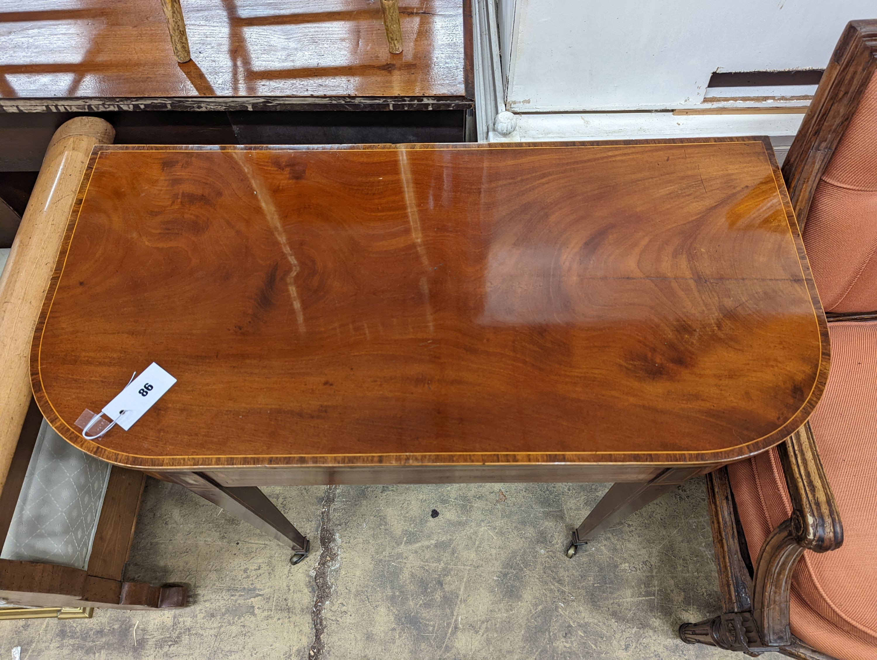 A Regency banded mahogany D shaped folding card table, width 90cm, depth 44cm, height 75cm